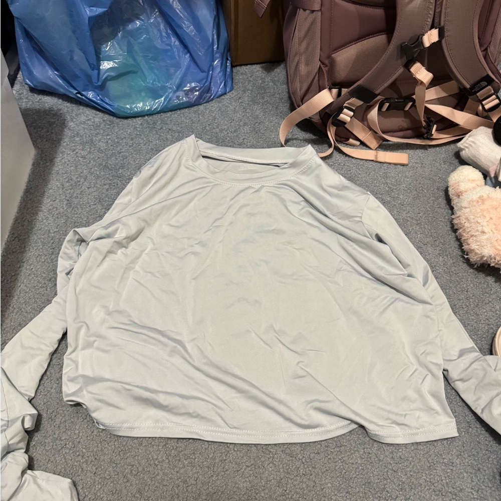 Grey athletic long sleeve top